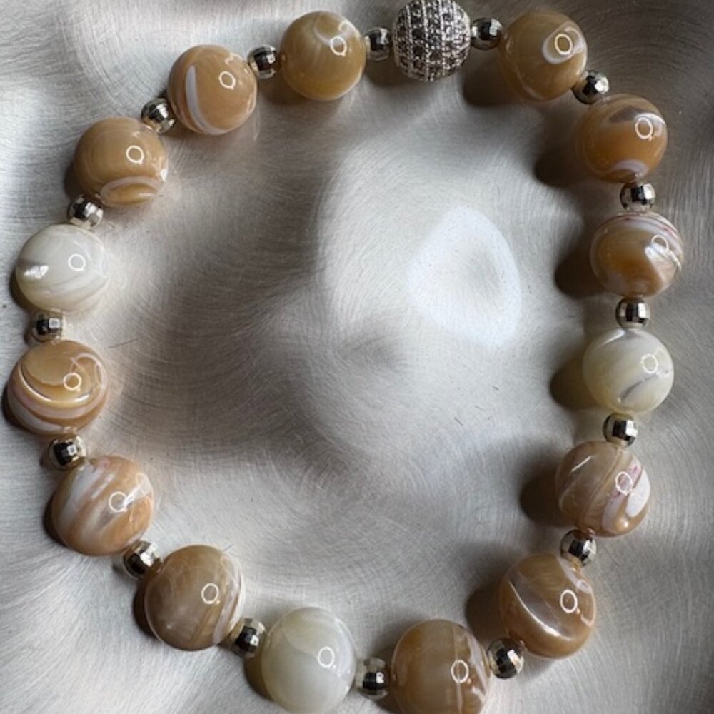 combination of natural stone beauty and metallic shimmer